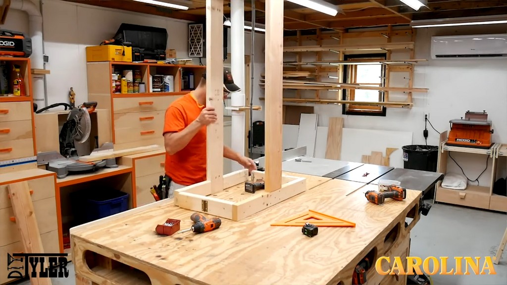 man constructing DIY woodworking build